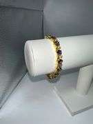 Beautiful 14 Kt Yellow Gold Plated Lab Simulated 16.5 Cttw Amethyst Diamond Tennis Bracelet