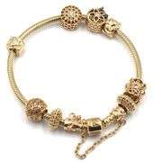 14kt Yellow gold Pandora bracelet with 10 charms