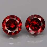 Mozambique red! 4.67ct matched round cut Garnet pair!