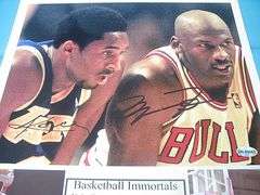 HAND SIGNED KOBE BRYANT AND MICHAEL JORDAN 8X10 MOUNTED ON A 11X14 DISPLAY WITH COA
