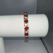 18 Kt Yellow Gold Plated Huge 32.5 Ctw Simulated Diamond and Ruby Tennis Bracelet