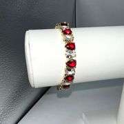 18 Kt Yellow Gold Plated Huge 32.5 Ctw Simulated Diamond and Ruby Tennis Bracelet