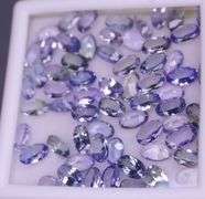 Untreated! Glittering 13.65ct oval cut Tanzanite set!