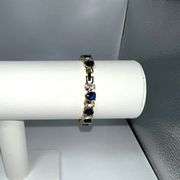 18 Kt. Yellow Gold Plated 32.5 Cwt. CZ and Simulated Sapphire Tennis Bracelet