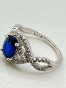 925 Sterling Silver Oval Blue Center Stone With Crystal Pave Details Ring
