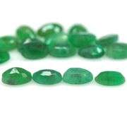 Rich emerald green 7.71ct 17pc Emerald set