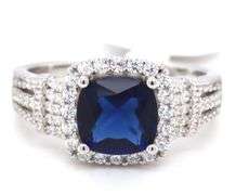 Blue cushion cut and white round cubic zirconia ring in 925 sterling silver