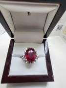 Very fine Ruby 11.22 ctw with diamond accent set in silver ring, EGL certified