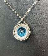 Sterling Silver Blue Topaz & Peridot Halo Pendant Necklace – Elegant Sparkling Design