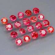 Uniquely colored 2.92ct imperial red Sapphire set