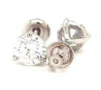 One pair of 14kt White gold 2.11ctw round brilliant cut diamond stud earrings