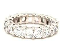 Sparkling 14K WG Anniversary Band with Asscher Cut CZ's.