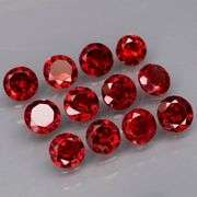 Outstanding 6.45ct diamond cut VS grade high fire Mozambique Garnet set