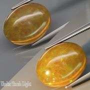 Smoldering! Huge! 7.30ct low profile semi-black Opal! From Ethiopia!