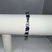 18 Kt White Gold Plated Huge 32.5 Ctw Lab Simulated Diamond and Midnight Blue Sapphire Tennis Bracel