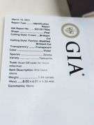 Very fine Tanzanite 1.44 ctw with diamond accent set in silver ring, GIA certified