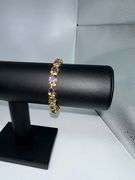 Beautiful 14 Kt Yellow Gold Plated Lab Simulated 16.5 Cttw Amethyst Diamond Tennis Bracelet