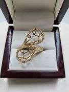 Handmade 18k gold designer ring featuring a diamond, ready for your selected pearl shape stone.