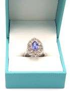 Elegant 1.17CTS Pear Shaped Tanzanite and 0.40CTW Diamond Ring in 14KT White Gold Over Sterling Silv