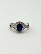 925 Sterling Silver Oval Blue Center Stone With Crystal Pave Details Ring