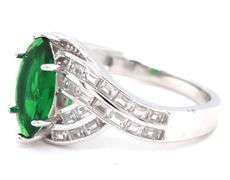Green marquise and white baguette cubic zirconia ring in 925 sterling silver