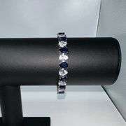 18 Kt White Gold Plated Huge 32.5 Ctw Lab Simulated Diamond and Midnight Blue Sapphire Tennis Bracel