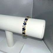 18 Kt. Yellow Gold Plated 32.5 Cwt. CZ and Simulated Sapphire Tennis Bracelet