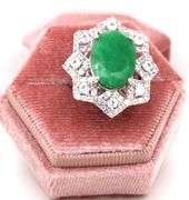Glittering 9.50CTW Oval Faceted Emerald & 2.30CTW White Sapphire Ring in Sterling Silver