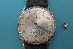 CONTENT OF SAFE DEPOSIT BOX: RARE VINTAGE ROLEX EXTRA PRIMA MEN'S WATCH