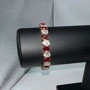 18 Kt Yellow Gold Plated Huge 32.5 Ctw Simulated Diamond and Ruby Tennis Bracelet