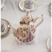 Hand-Painted Ceramic Teapot with Embossed Rose Design
