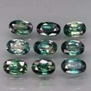 Heated only! 3.10ct blue green Australian Sapphire set