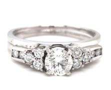 14kt White gold 0.65ct center diamond with 0.35ctw side diamond wedding set