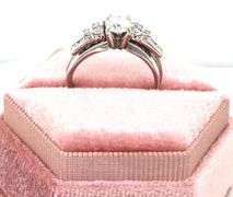 14kt White gold 0.65ct center diamond with 0.35ctw side diamond wedding set