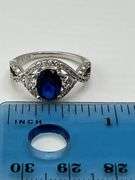 925 Sterling Silver Oval Blue Center Stone With Crystal Pave Details Ring