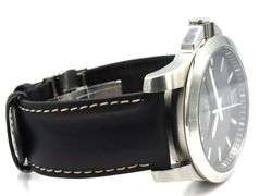 Longines Conquest 43mm black dial on leather strap watch