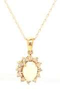 14kt Yellow gold oval opal and diamond halo pendant on chain