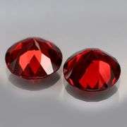 Mozambique red! 4.67ct matched round cut Garnet pair!