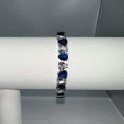 18 Kt White Gold Plated Huge 32.5 Ctw Lab Simulated Diamond and Midnight Blue Sapphire Tennis Bracel