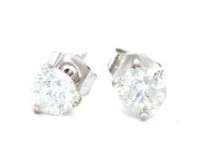One pair of 14kt white gold 0.86ctw RBC diamond stud earrings