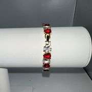 18 Kt Yellow Gold Plated Huge 32.5 Ctw Simulated Diamond and Ruby Tennis Bracelet