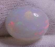 Multi-patterned! Smoldering color! 7.92 carats! Snow white Opal!
