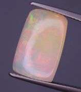 Phenomenal full spectrum flashing 4.81ct semi-black Opal