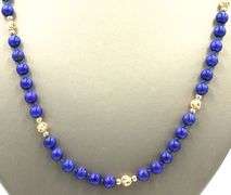 Lapis and gold beads station necklace
