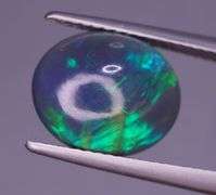 Magnificent 2.48ct full body flashing Semi Black Opal