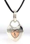 Tiffany & Co two tone Padlock pendant on black cord necklace