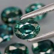 Heated only! 2.51ct blue green Sapphire set from Australia!