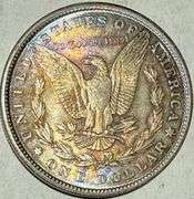 1899 O Slider Toned Morgan Dollar
