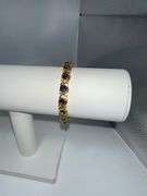 Beautiful 14 Kt Yellow Gold Plated Lab Simulated 16.5 Cttw Amethyst Diamond Tennis Bracelet