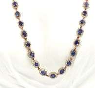 Darling 18.05CTW Oval Shaped Emerald Cut Blue Sapphire & 4.00CTW Round Single Faceted Diamond Tennis